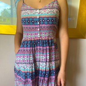 12. TNT, XS multi color pattern with pinched back